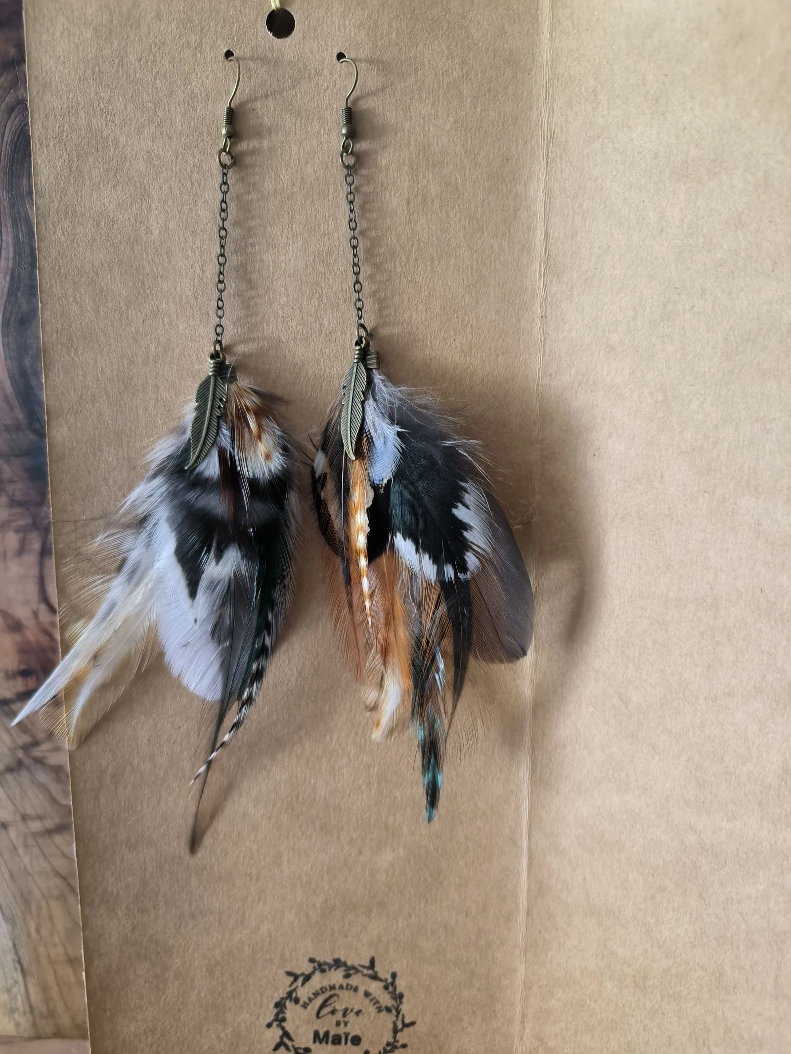 Boucles d'oreilles pendantes originales en plumes naturelles